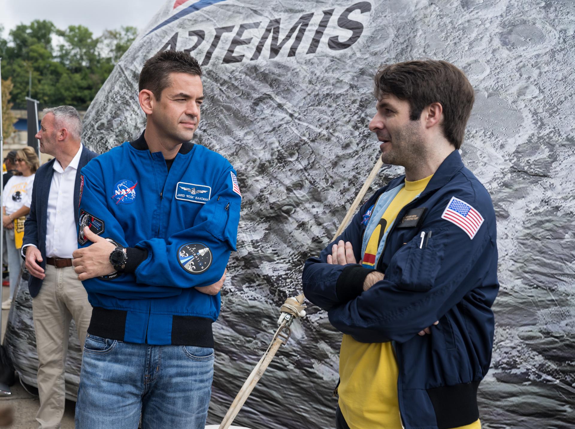 NASA Administrator Jared Isaacman and Anthony Vareha, NASA Flight Director at NASA’s Johnson Space Center are seen in the NASA Experience Zone at an NFL game between the Pittsburgh Steelers and the Atlanta Falcons at Acrisure Stadium, Sunday, Sept. 13, 2026, in Pittsburgh, Pennsylvania. NASA’s engagement at NFL games is part of the agency's Inspiration Tour, aimed at strengthening connections between NASA and its partners and showcasing innovation in air and space in the lead up to the MAX POWER aerospace technology expo and airshow at the agency's Kennedy Space Center in early November. Photo Credit: (NASA/Aubrey Gemignani)