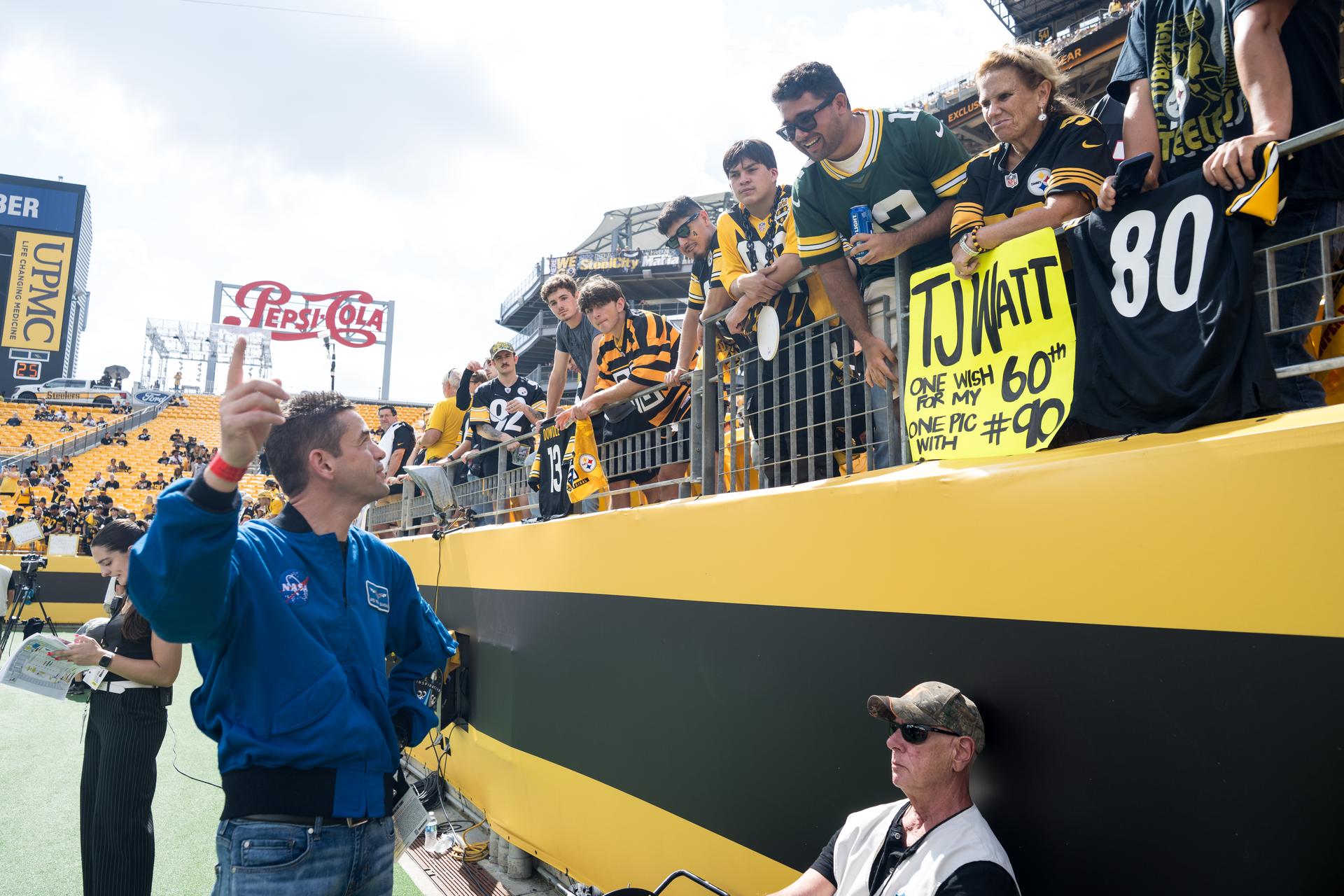 NASA Administrator Jared Isaacman greets fans at an NFL game between the Pittsburgh Steelers and the Atlanta Falcons at Acrisure Stadium, Sunday, Sept. 13, 2026, in Pittsburgh, Pennsylvania. NASA’s engagement at NFL games is part of the agency's Inspiration Tour, aimed at strengthening connections between NASA and its partners and showcasing innovation in air and space in the lead up to the MAX POWER aerospace technology expo and airshow at the agency's Kennedy Space Center in early November. Photo Credit: (NASA/Aubrey Gemignani)