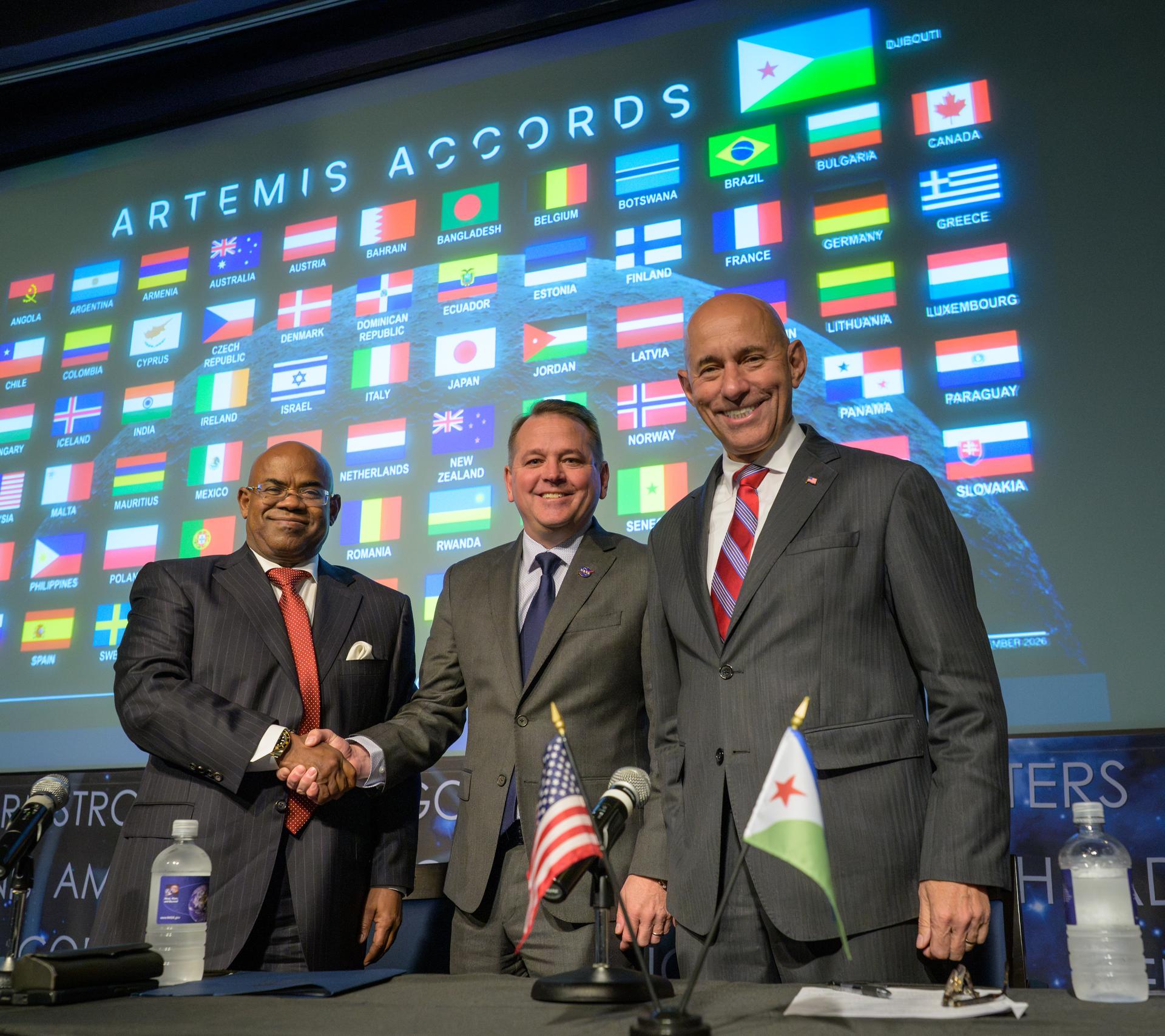 NASA Deputy Administrator Matt Anderson, center, Ambassador of Djibouti to the United States, Mohamed Siad Douale, left, and Assistant Secretary of State for African Affairs, Frank Garcia, right, pose for a group photograph after the Artemis Accord signing, Monday, September 14, 2026, at the Mary W. Jackson NASA Headquarters building in Washington. Djibouti is the 72nd country to sign the Artemis Accords, which establish a practical set of principles to guide space exploration cooperation among nations participating in NASA’s Artemis program. Photo Credit: (NASA/Bill Ingalls)