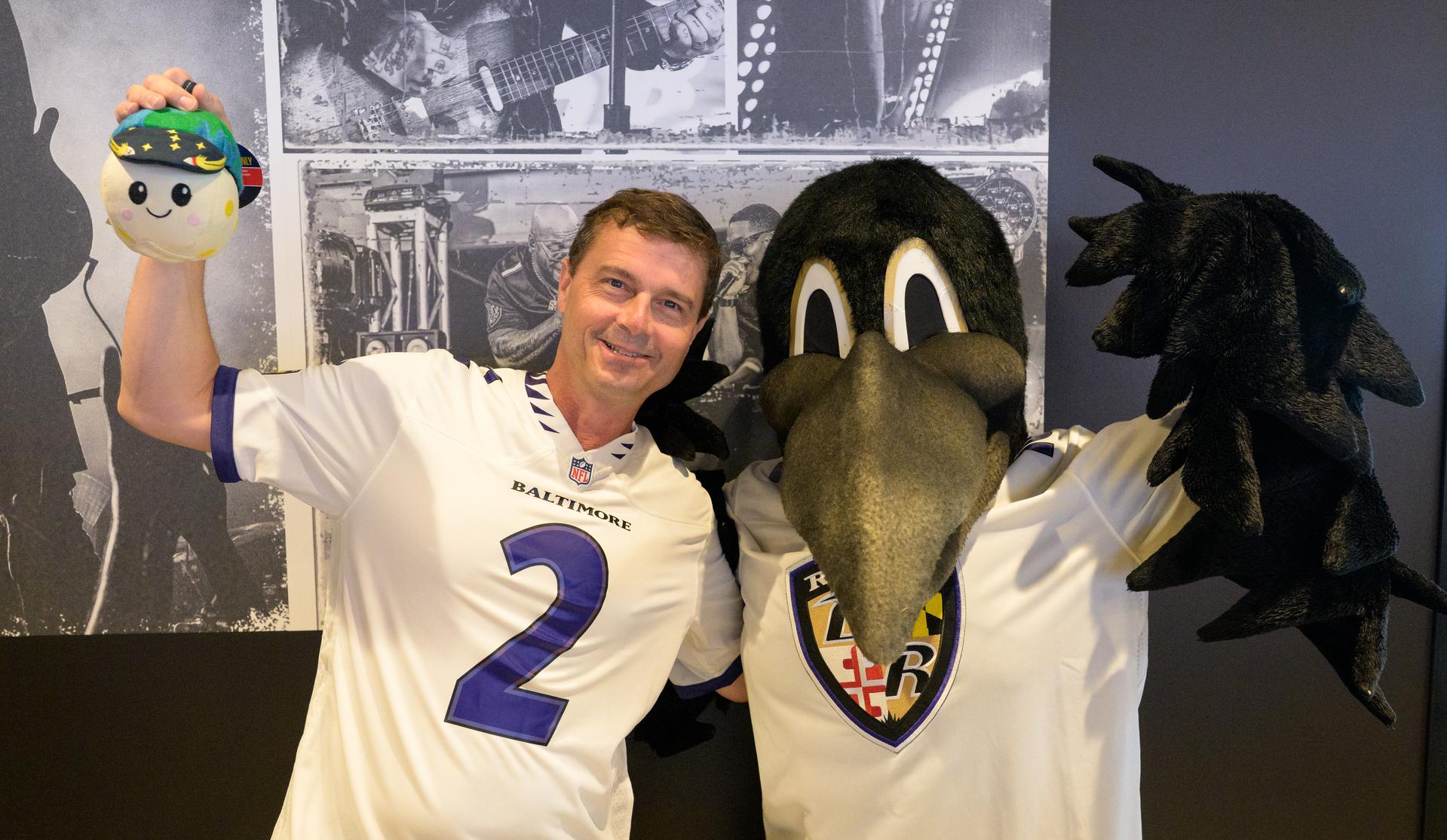 NASA astronaut and commander of the agency’s Artemis II mission, Reid Wiseman, a Baltimore native, holds Rise, the zero gravity indicator from the Artemis II mission, as he poses for a photograph with Baltimore Ravens mascot Poe at an NFL game between the New Orleans Saints and the Baltimore Ravens at M&T Bank Stadium, Sunday, Sept. 20, 2026, in Baltimore. NASA’s engagement at NFL games is part of the agency's Inspiration Tour, aimed at strengthening connections between NASA and its partners and showcasing innovation in air and space in the lead up to the MAX POWER aerospace technology expo and airshow at the agency's Kennedy Space Center in early November. Photo Credit: (NASA/Bill Ingalls)