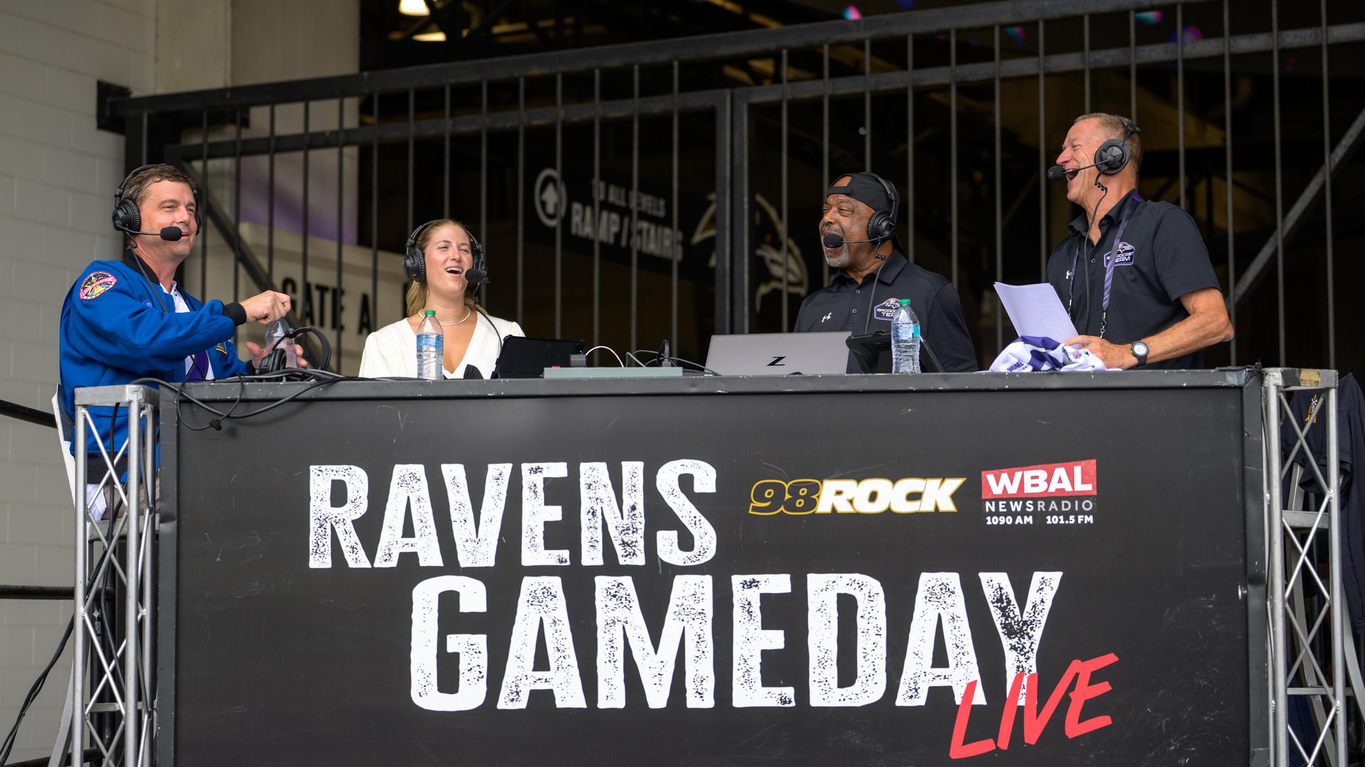 NASA astronaut and commander of the agency’s Artemis II mission, Reid Wiseman, a Baltimore native, left, joins Valerie Preactor, Kirk McEwen, and Keith Mills, right, for a WBAL radio interview prior to the start of an NFL game between the New Orleans Saints and the Baltimore Ravens at M&T Bank Stadium, Sunday, Sept. 20, 2026, in Baltimore. NASA’s engagement at NFL games is part of the agency's Inspiration Tour, aimed at strengthening connections between NASA and its partners and showcasing innovation in air and space in the lead up to the MAX POWER aerospace technology expo and airshow at the agency's Kennedy Space Center in early November. Photo Credit: (NASA/Bill Ingalls)