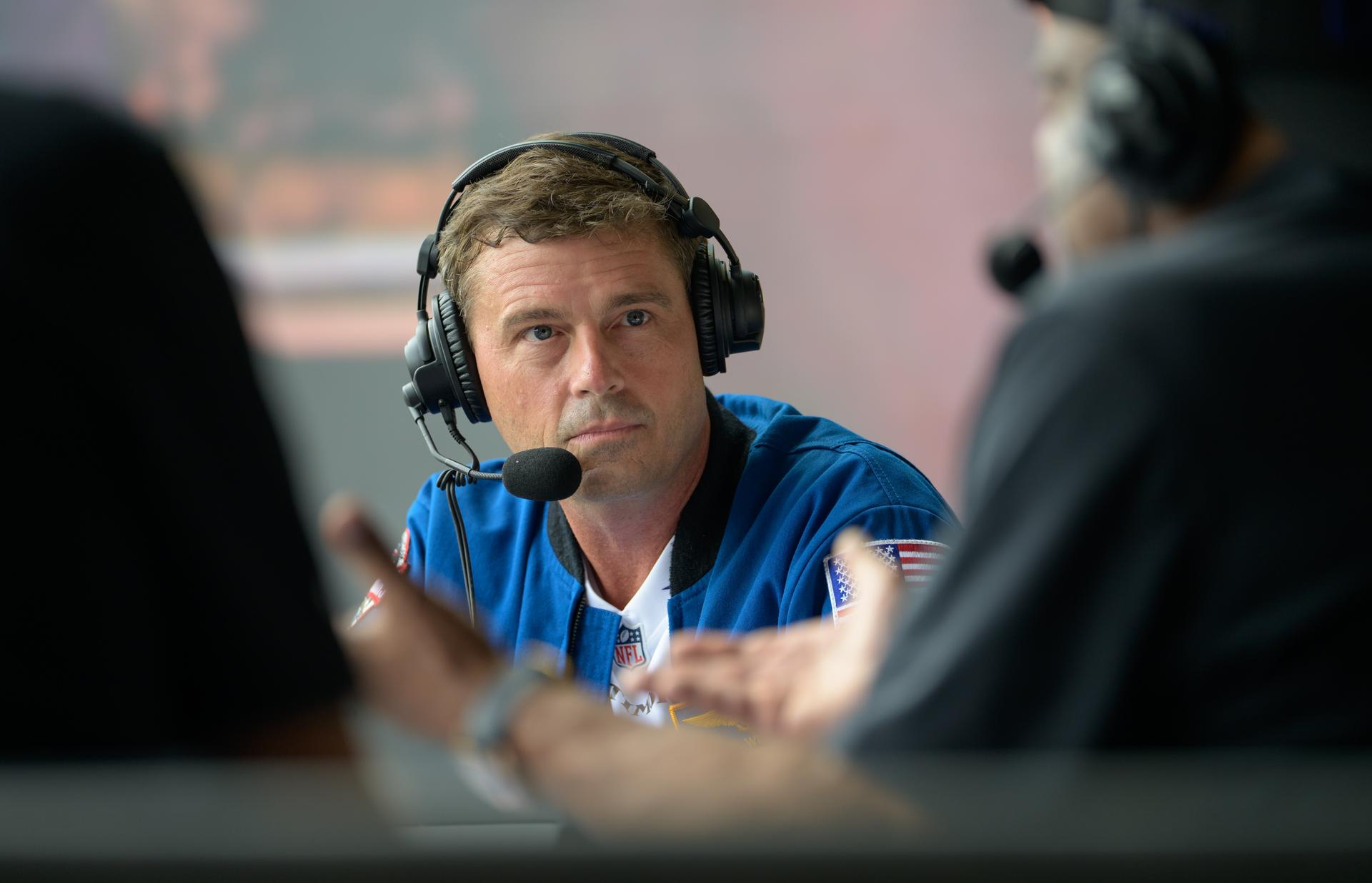 NASA astronaut and commander of the agency’s Artemis II mission, Reid Wiseman, a Baltimore native, is seen during an WBAL radio interview prior to the start of an NFL game between the New Orleans Saints and the Baltimore Ravens at M&T Bank Stadium, Sunday, Sept. 20, 2026, in Baltimore. NASA’s engagement at NFL games is part of the agency's Inspiration Tour, aimed at strengthening connections between NASA and its partners and showcasing innovation in air and space in the lead up to the MAX POWER aerospace technology expo and airshow at the agency's Kennedy Space Center in early November. Photo Credit: (NASA/Bill Ingalls)