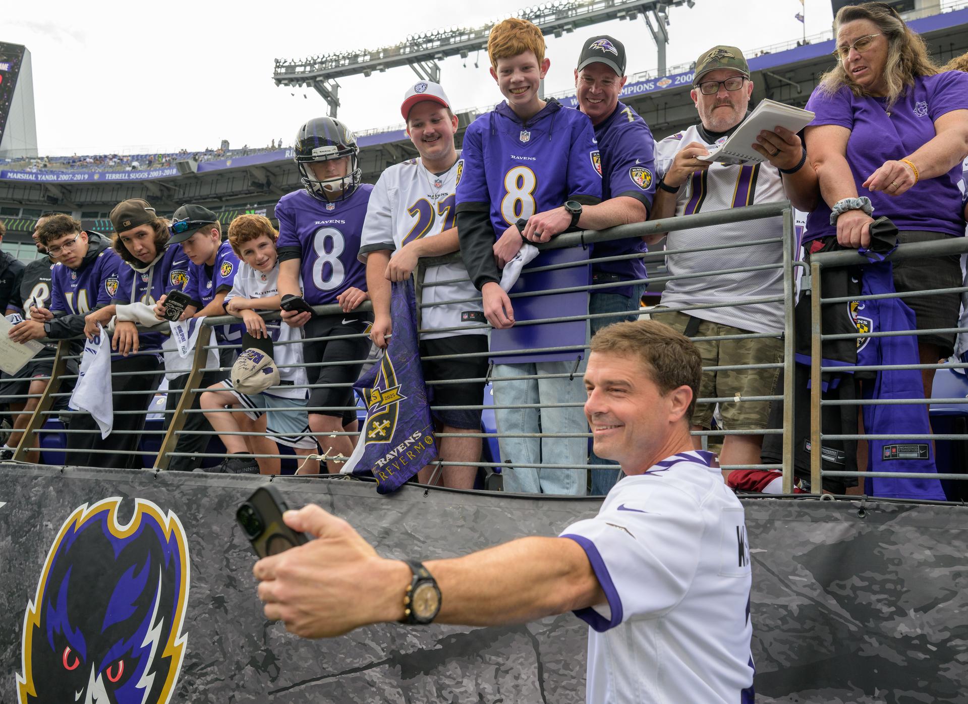 NASA astronaut and commander of the agency’s Artemis II mission, Reid Wiseman, a Baltimore native, does a selfie photograph with fans at an NFL game between the New Orleans Saints and the Baltimore Ravens at M&T Bank Stadium, Sunday, Sept. 20, 2026, in Baltimore. NASA’s engagement at NFL games is part of the agency's Inspiration Tour, aimed at strengthening connections between NASA and its partners and showcasing innovation in air and space in the lead up to the MAX POWER aerospace technology expo and airshow at the agency's Kennedy Space Center in early November. Photo Credit: (NASA/Bill Ingalls)