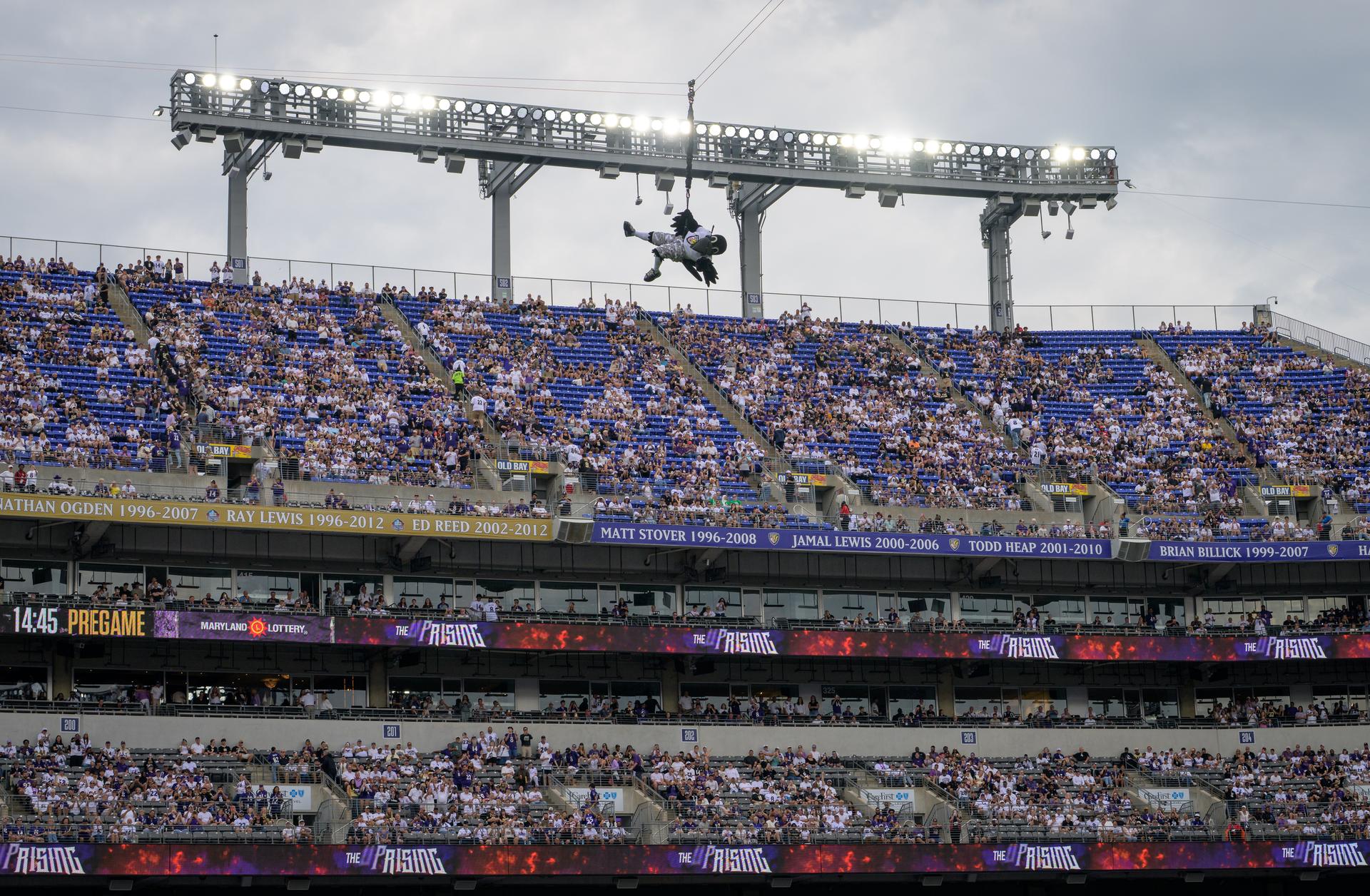 Baltimore Ravens mascot Poe is seen during a pregame show at an NFL game between the New Orleans Saints and the Baltimore Ravens at M&T Bank Stadium, Sunday, Sept. 20, 2026, in Baltimore. NASA’s engagement at NFL games is part of the agency's Inspiration Tour, aimed at strengthening connections between NASA and its partners and showcasing innovation in air and space in the lead up to the MAX POWER aerospace technology expo and airshow at the agency's Kennedy Space Center in early November. Photo Credit: (NASA/Bill Ingalls)
