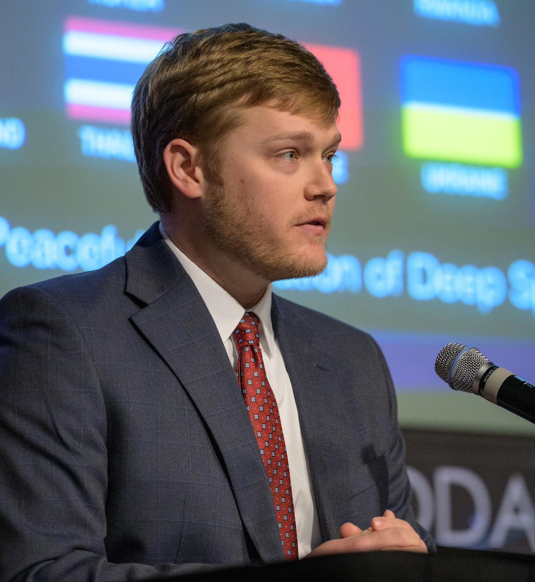 U.S. Deputy Assistant Secretary of State for Space and Environment Connor Tomlinson gives remarks during an Artemis Accord signing ceremony with the Republic of Albania Monday, September 21, 2026, at the Mary W. Jackson NASA Headquarters building in Washington. Albania is the 73rd country to sign the Artemis Accords, which establish a practical set of principles to guide space exploration cooperation among nations participating in NASA’s Artemis program.  Photo Credit: (NASA/Bill Ingalls)