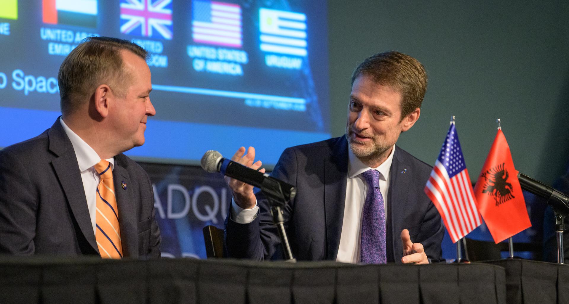 NASA Deputy Administrator Matt Anderson, left, listens as Albania’s Minister for Europe and Foreign Affairs Ferit Hoxha gives remarks during an Artemis Accords signing ceremony with the Republic of Albania Monday, September 21, 2026, at the Mary W. Jackson NASA Headquarters building in Washington. Albania is the 73rd country to sign the Artemis Accords, which establish a practical set of principles to guide space exploration cooperation among nations participating in NASA’s Artemis program. Photo Credit: (NASA/Bill Ingalls)