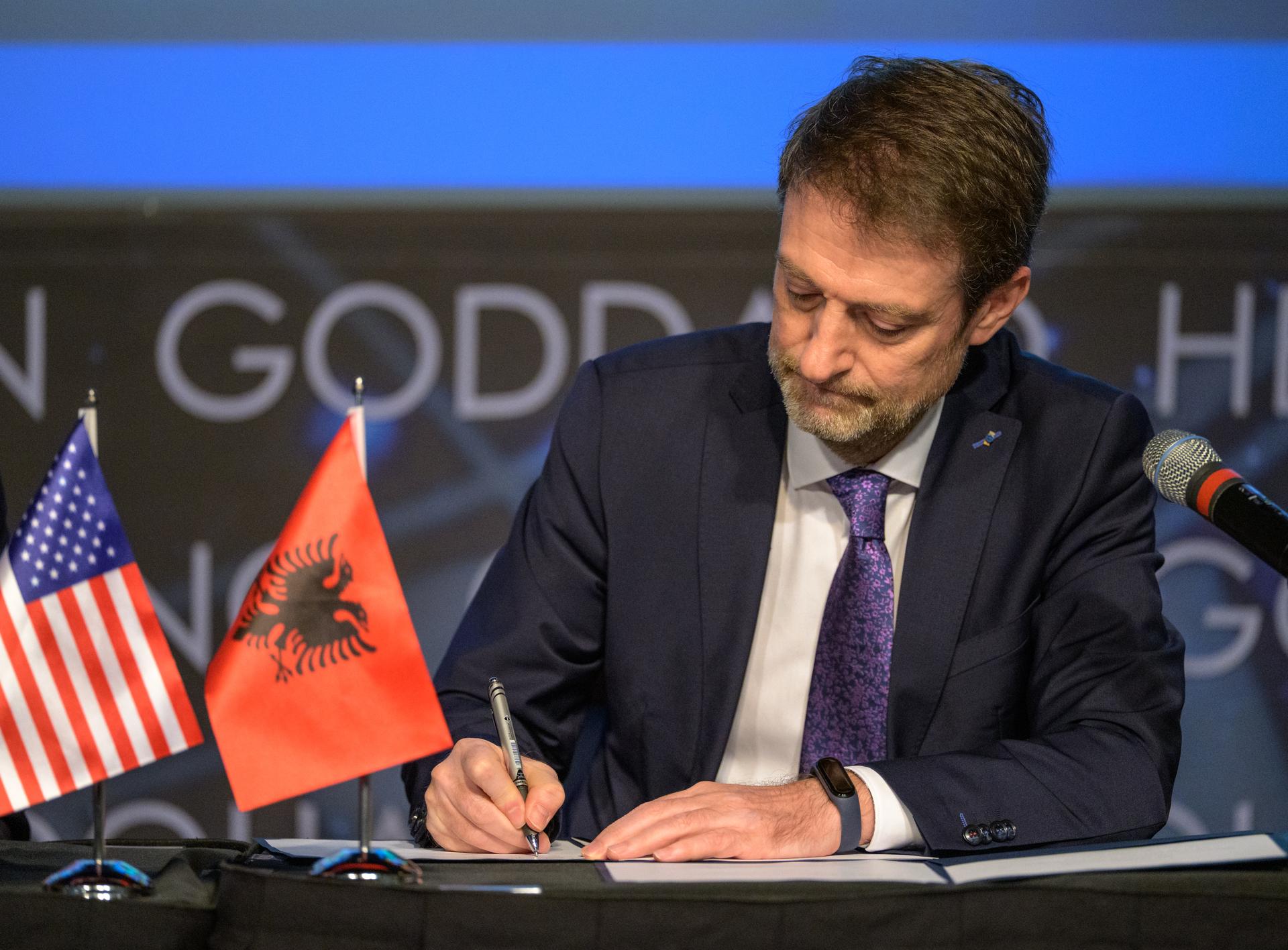 Albania’s Minister for Europe and Foreign Affairs Ferit Hoxha signs the Artemis Accords during a ceremony Monday, September 21, 2026, at the Mary W. Jackson NASA Headquarters building in Washington. Albania is the 73rd country to sign the Artemis Accords, which establish a practical set of principles to guide space exploration cooperation among nations participating in NASA’s Artemis program.  Photo Credit: (NASA/Bill Ingalls)