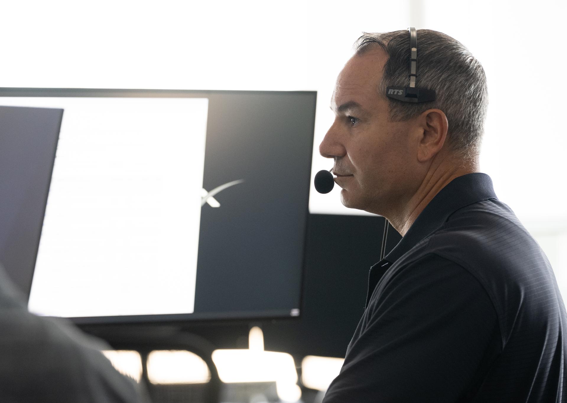 Kevin Vega, NASA’s Commercial Crew Program Chief Engineer, monitors the countdown during a dress rehearsal in preparation for the launch of a SpaceX Falcon 9 rocket carrying the company's Dragon spacecraft on NASA’s SpaceX Crew-13 mission with NASA astronauts Jessica Watkins and Luke Delaney, CSA (Canadian Space Agency) astronaut Joshua Kutryk, and Roscosmos cosmonaut Sergey Teteryatnikov onboard, Tuesday, Sept. 29, 2026, in the control room of SpaceX’s HangarX at NASA’s Kennedy Space Center in Florida. NASA’s SpaceX Crew-13 mission is the 13th crew rotation mission of the SpaceX Dragon spacecraft and Falcon 9 rocket to the International Space Station as part of the agency’s Commercial Crew Program. Watkins, Delaney, Kutryk, Teteryatnikov are scheduled to launch on 11:10 a.m. EDT on Thursday, Oct. 1, from Space Launch Complex 40 at the Cape Canaveral Space Force Station. Photo Credit: (NASA/Joel Kowsky)