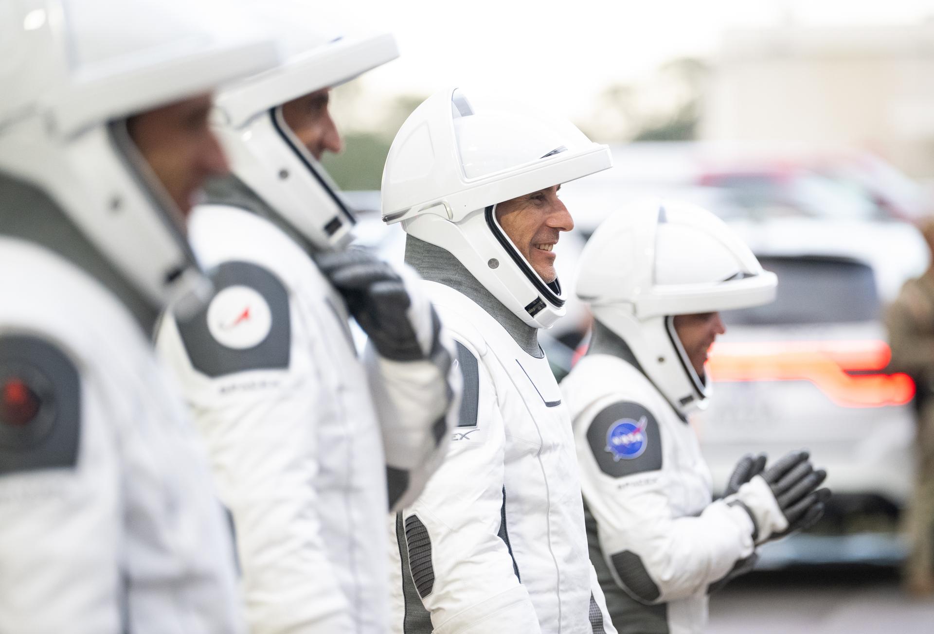 NASA astronaut Luke Delaney is seen alongside fellow crewmates Jessica Watkins, CSA (Canadian Space Agency) astronaut Joshua Kutryk, and Roscosmos cosmonaut Sergey Teteryatnikov, wearing SpaceX spacesuits, as they prepare to depart the Neil  A. Armstrong Operations and Checkout Building for Space Launch Complex 40 on Cape Canaveral Space Force Station to board the SpaceX Dragon spacecraft for the Crew-13 mission launch, Thursday, Oct. 1, 2026, at NASA’s Kennedy Space Center in Florida. NASA’s SpaceX Crew-13 mission is the 13th crew rotation mission of the SpaceX Crew Dragon spacecraft and Falcon 9 rocket to the International Space Station as part of the agency’s Commercial Crew Program. Watkins, Delaney, Kutryk, Teteryatnikov are scheduled to launch at 11:10 a.m. EDT, from Space Launch Complex 40 at the Cape Canaveral Space Force Station.  Photo Credit: (NASA/Joel Kowsky)
