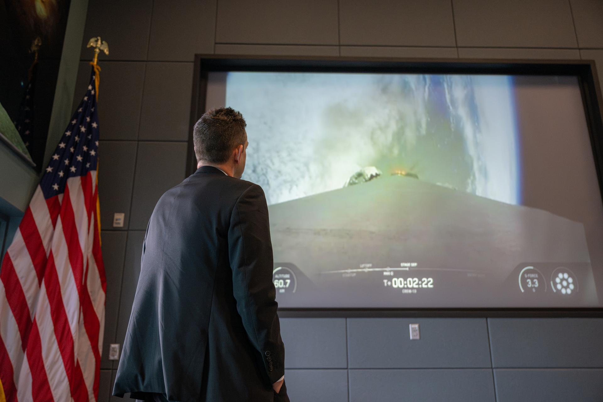 NASA Administrator Jared Isaacman watches a webcast of the launch of a SpaceX Falcon 9 rocket carrying the company’s Dragon spacecraft on NASA’s SpaceX Crew-13 mission to the International Space Station with NASA astronauts Jessica Watkins and Luke Delaney, CSA (Canadian Space Agency) astronaut Joshua Kutryk, and Roscosmos cosmonaut Sergey Teteryatnikov, Thursday, Oct. 1, 2026, at the Operations Support Building II at NASA’s Kennedy Space Center in Florida. NASA’s SpaceX Crew-13 mission is the thirteenth crew rotation mission of the SpaceX Falcon 9 rocket and Dragon spacecraft to the International Space Station as part of the agency’s Commercial Crew Program. Watkins, Delaney, Kutryk, and Teteryatnikov launched at 11:10 a.m. EDT from Space Launch Complex 40 at Cape Canaveral Space Force Station in Florida to begin their mission aboard the orbital outpost. Photo Credit: (NASA/John Kraus)