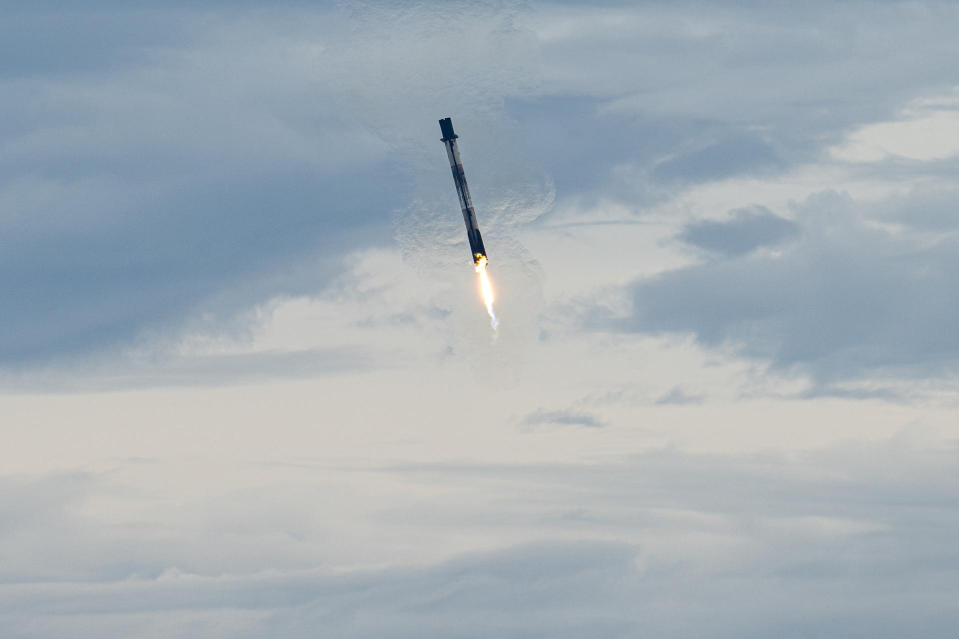 The first stage of a SpaceX Falcon 9 rocket lands at Landing Zone 40, Thursday, Oct. 1, 2026, at Cape Canaveral Space Force Station in Florida. The Falcon 9 first stage supported the launch of NASA’s SpaceX Crew-13 mission to the International Space Station with NASA astronauts Jessica Watkins and Luke Delaney, CSA (Canadian Space Agency) astronaut Joshua Kutryk, and Roscosmos cosmonaut Sergey Teteryatnikov. NASA’s SpaceX Crew-13 mission is the thirteenth crew rotation mission of the SpaceX Falcon 9 rocket and Dragon spacecraft to the International Space Station as part of the agency’s Commercial Crew Program. Watkins, Delaney, Kutryk, and Teteryatnikov launched at 11:10 a.m. EDT from Space Launch Complex 40 at Cape Canaveral Space Force Station to begin their mission aboard the orbital outpost. Photo Credit: (NASA/John Kraus)