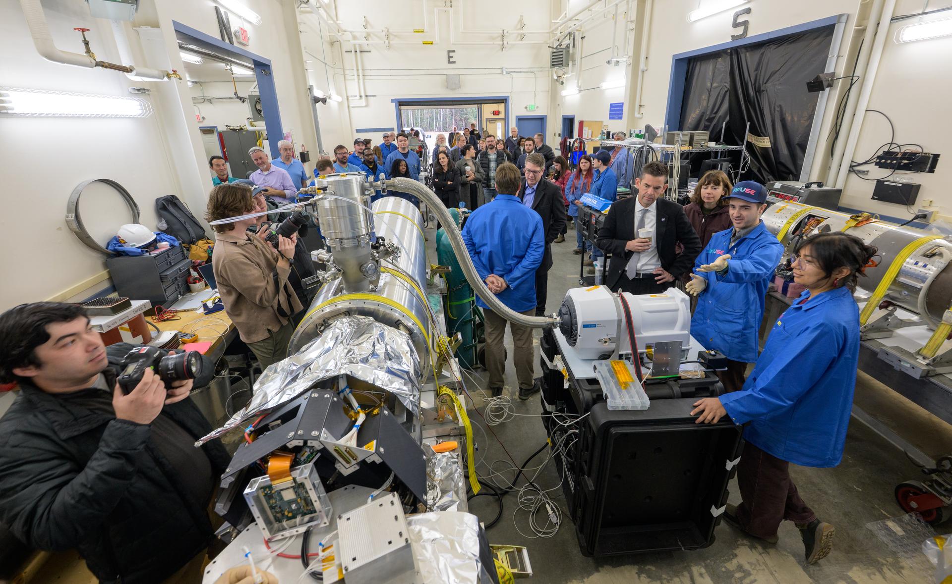 NASA Administrator Jared Isaacman, right, and Rep. Nick Begich, R-Alaska, center,  view the INtegral Field far-Ultraviolet Spectroscopic Experiment (INFUSE) and talk with employees at the Poker Flat Research Range, Monday, Oct. 5, 2026, in Fairbanks, Alaska. NASA’s visit to Alaska is part of the agency's Inspiration Tour, aimed at strengthening connections between NASA and its partners and showcasing innovation in air and space in the lead up to the MAX POWER aerospace technology expo and airshow at the agency's Kennedy Space Center in early November. Photo Credit: (NASA/Bill Ingalls)