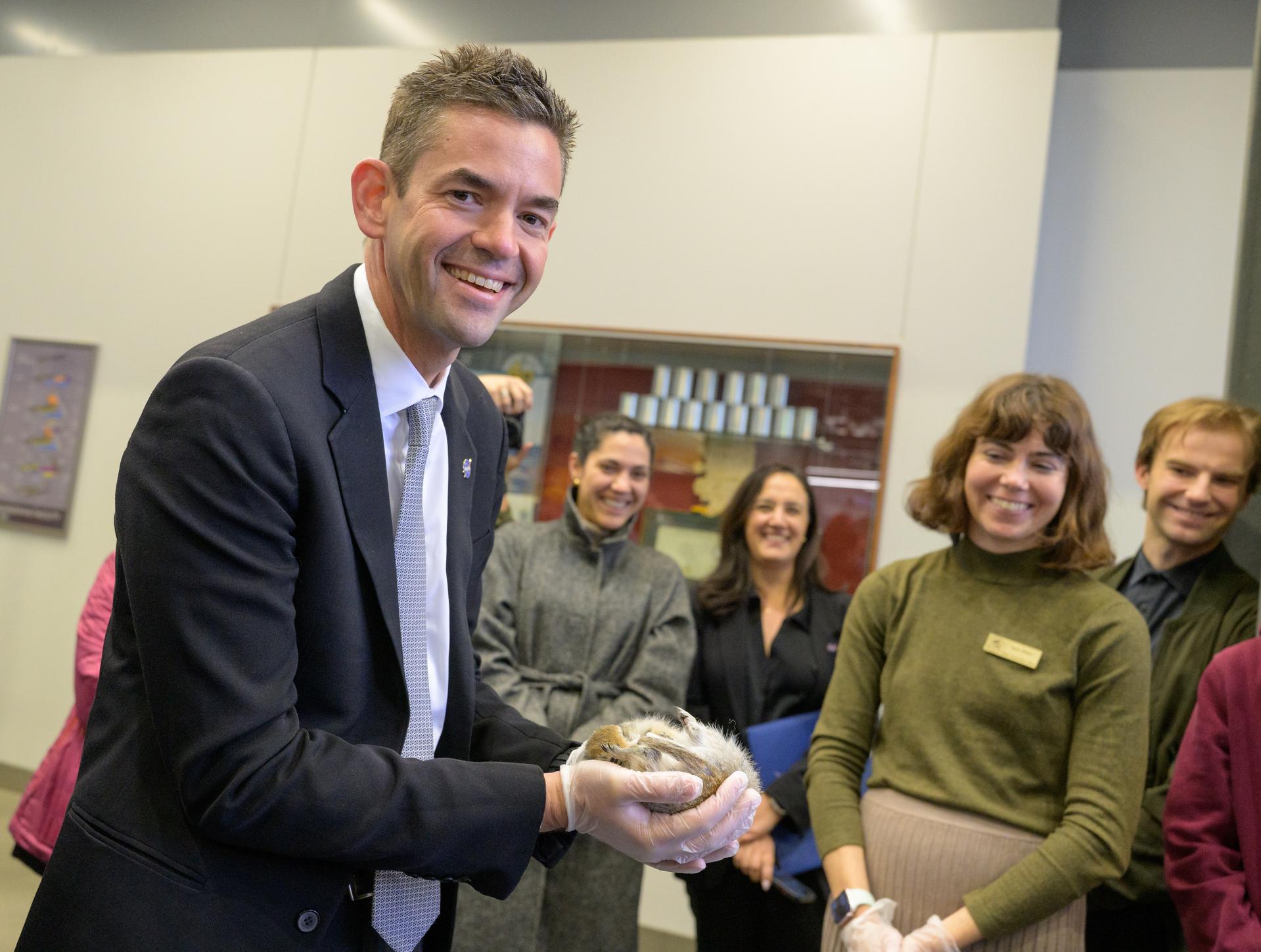 NASA Administrator Jared Isaacman holds a hibernating Arctic ground squirrel during a Space Grant Science Science Fare, Monday, Oct. 5, 2026, at the University of Alaska Fairbanks, in Fairbanks, Alaska. Hibernation is a naturally occurring phenomenon in ground squirrels and other species in which metabolic rate and core body temperature are drastically reduced for extended periods. The study looks at the ability of the squirrels to retain muscle and bone mass during extended hibernation and they think it could apply to astronauts. NASA’s visit to Alaska is part of the agency's Inspiration Tour, aimed at strengthening connections between NASA and its partners and showcasing innovation in air and space in the lead up to the MAX POWER aerospace technology expo and airshow at the agency's Kennedy Space Center in early November. Photo Credit: (NASA/Bill Ingalls)