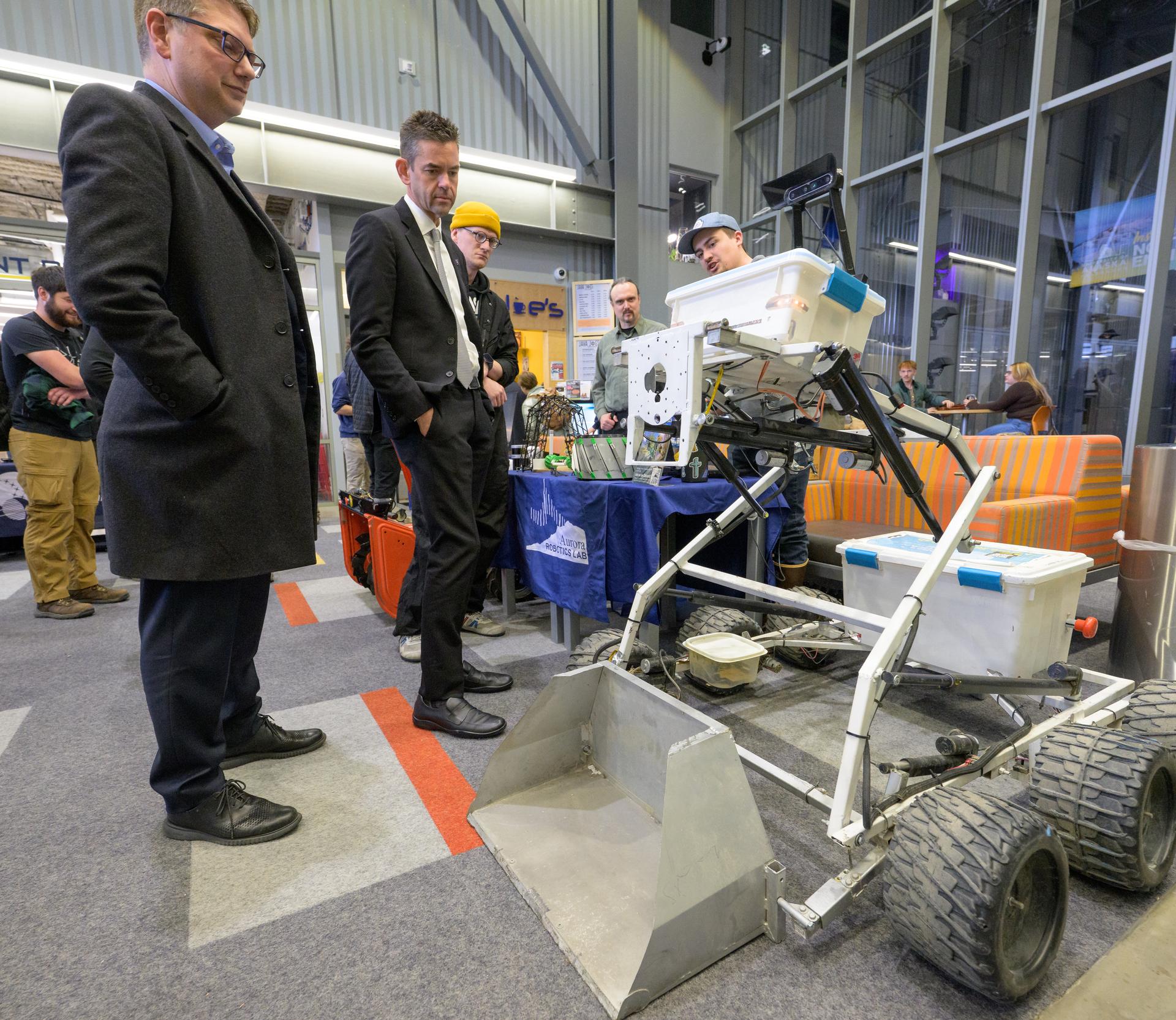 Rep. Nick Begich, R-Alaska, left, and NASA Administrator Jared Isaacman, meet with Space Grant students during a Science Fare, Monday, Oct. 5, 2026, at the University of Alaska Fairbanks, in Fairbanks, Alaska. NASA’s visit to Alaska is part of the agency's Inspiration Tour, aimed at strengthening connections between NASA and its partners and showcasing innovation in air and space in the lead up to the MAX POWER aerospace technology expo and airshow at the agency's Kennedy Space Center in early November. Photo Credit: (NASA/Bill Ingalls)