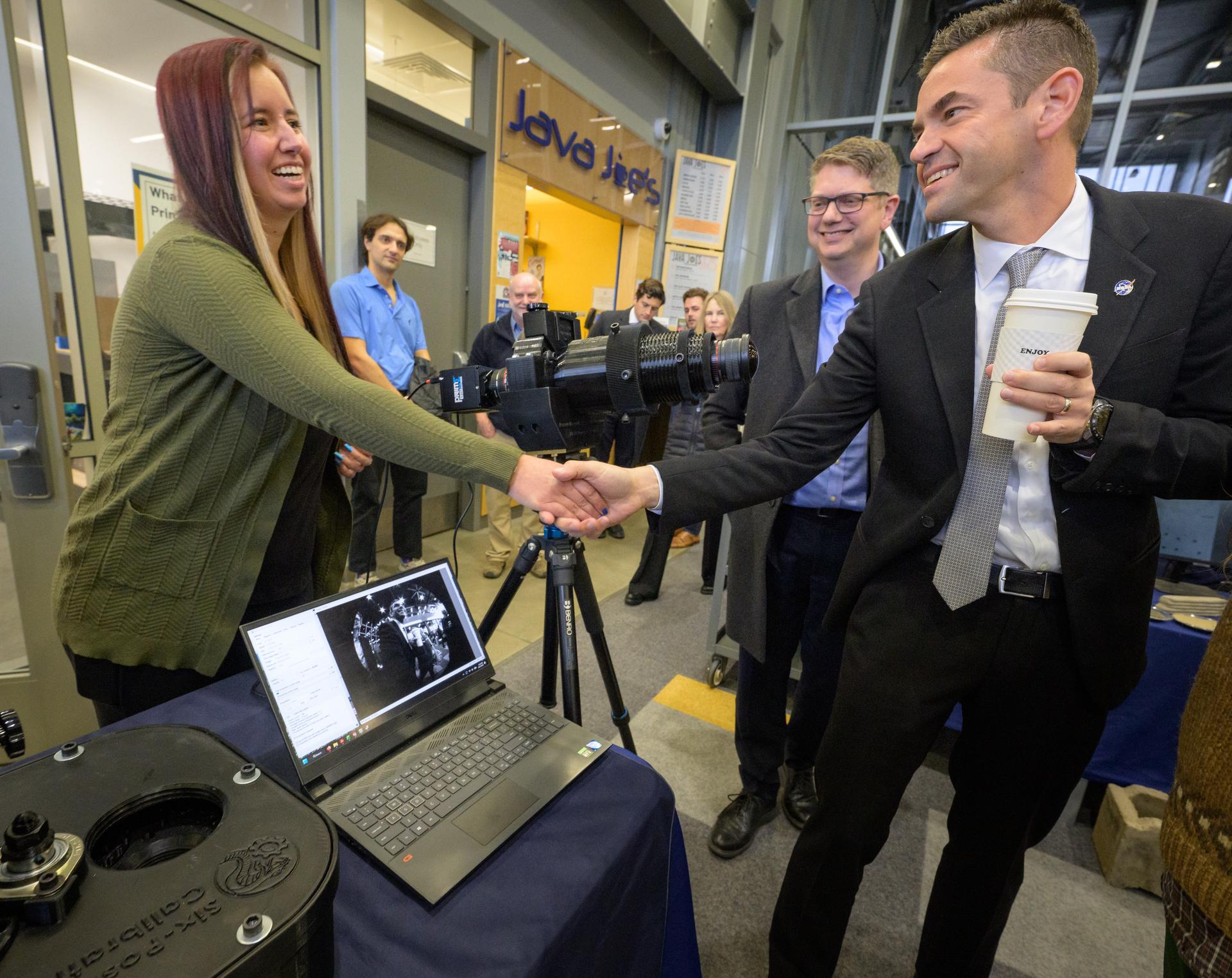 Rep. Nick Begich, R-Alaska, center, and NASA Administrator Jared Isaacman, meet with Space Grant students during a Science Fare, Monday, Oct. 5, 2026, at the University of Alaska Fairbanks, in Fairbanks, Alaska. NASA’s visit to Alaska is part of the agency's Inspiration Tour, aimed at strengthening connections between NASA and its partners and showcasing innovation in air and space in the lead up to the MAX POWER aerospace technology expo and airshow at the agency's Kennedy Space Center in early November. Photo Credit: (NASA/Bill Ingalls)