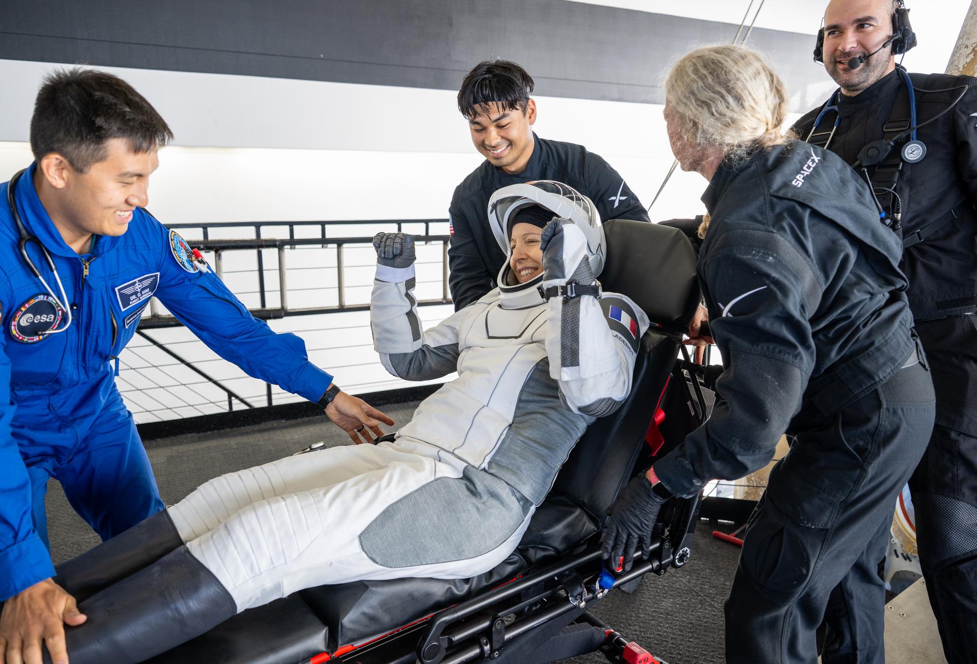 ESA (European Space Agency) astronaut Sophie Adenot is helped out of the SpaceX Dragon Freedom spacecraft onboard the SpaceX recovery ship SHANNON after she and NASA astronauts Jessica Meir, Jack Hathaway, and Roscosmos cosmonaut Andrey Fedyaev landed in the Pacific Ocean off the coast of Los Angeles, Calif., Thursday, Oct. 8, 2026. Meir, Hathaway, Adenot, and Fedyaev are returning after seven-months in space as part of Expedition 74 aboard the International Space Station. Photo Credit: (NASA/Keegan Barber)