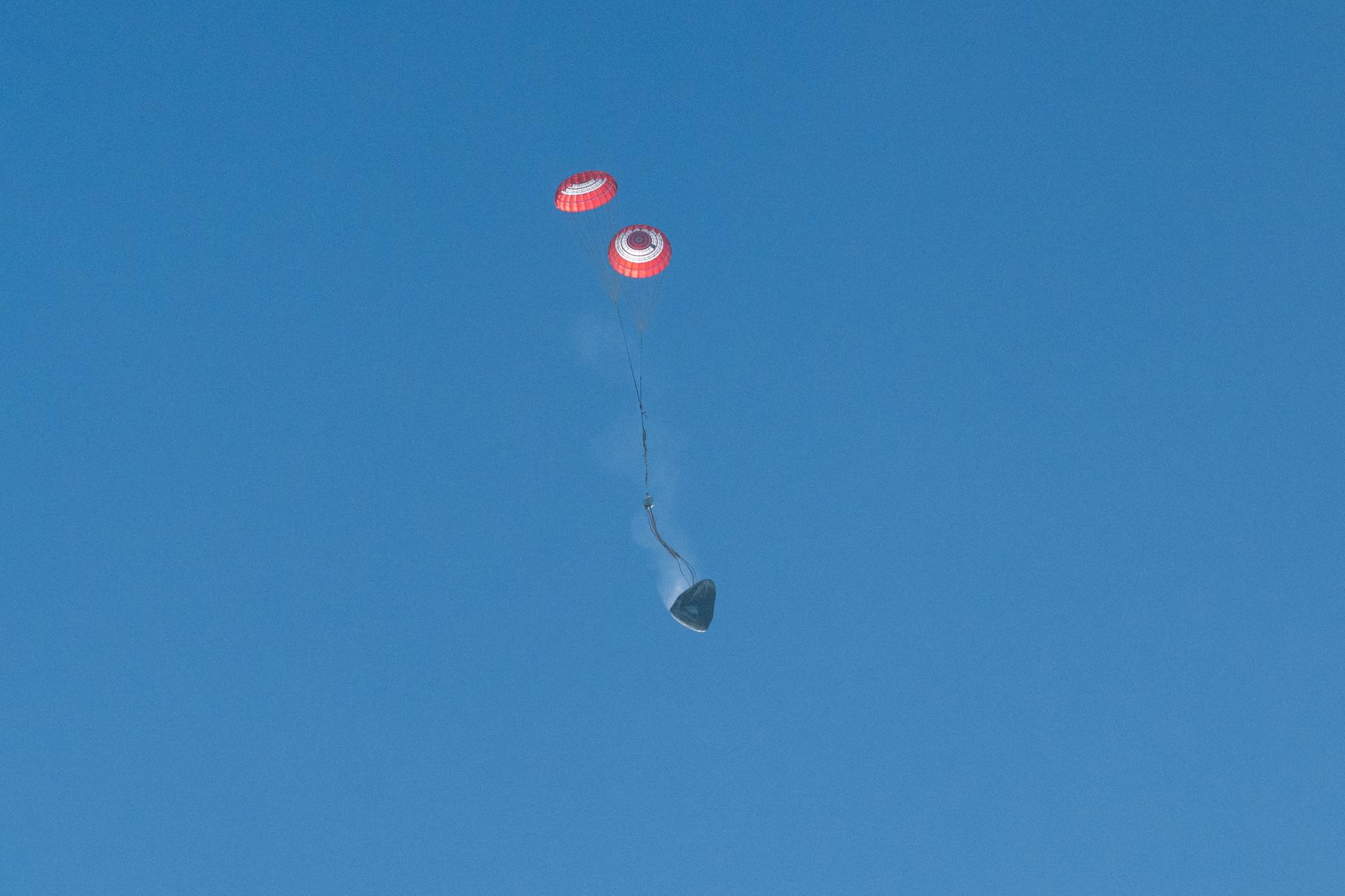 The SpaceX Crew Dragon Freedom spacecraft is seen as it lands with NASA astronauts Jessica Meir, Jack Hathaway, ESA (European Space Agency) astronaut Sophie Adenot, and Roscosmos cosmonaut Andrey Fedyaev aboard in the Pacific Ocean off the coast of Los Angeles, Calif., Thursday, Oct. 8, 2026. Meir, Hathaway, Adenot, and Fedyaev are returning after seven-months in space as part of Expedition 74 aboard the International Space Station. Photo Credit: (NASA/Keegan Barber)