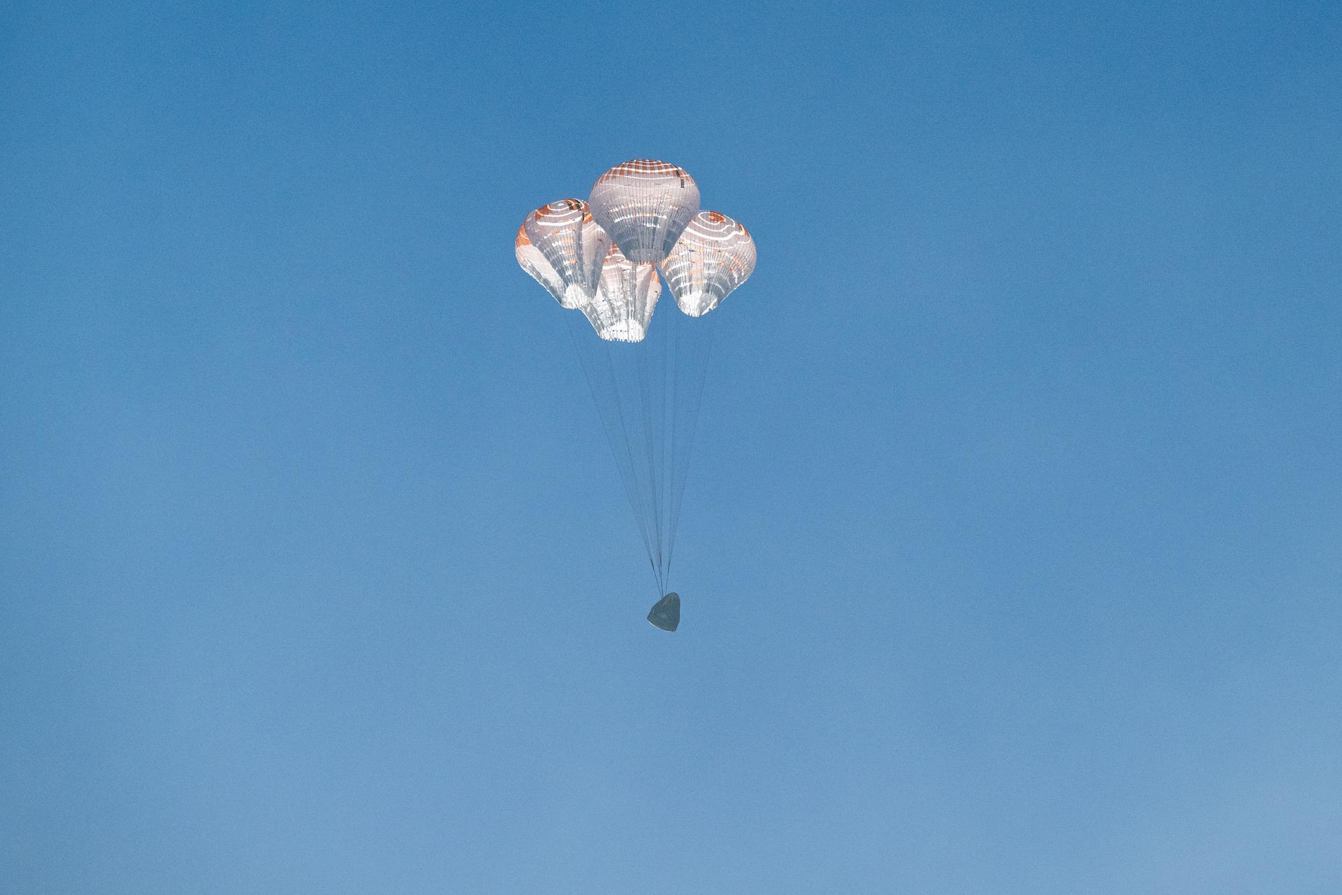 The SpaceX Crew Dragon Freedom spacecraft is seen as it lands with NASA astronauts Jessica Meir, Jack Hathaway, ESA (European Space Agency) astronaut Sophie Adenot, and Roscosmos cosmonaut Andrey Fedyaev aboard in the Pacific Ocean off the coast of Los Angeles, Calif., Thursday, Oct. 8, 2026. Meir, Hathaway, Adenot, and Fedyaev are returning after seven-months in space as part of Expedition 74 aboard the International Space Station. Photo Credit: (NASA/Keegan Barber)