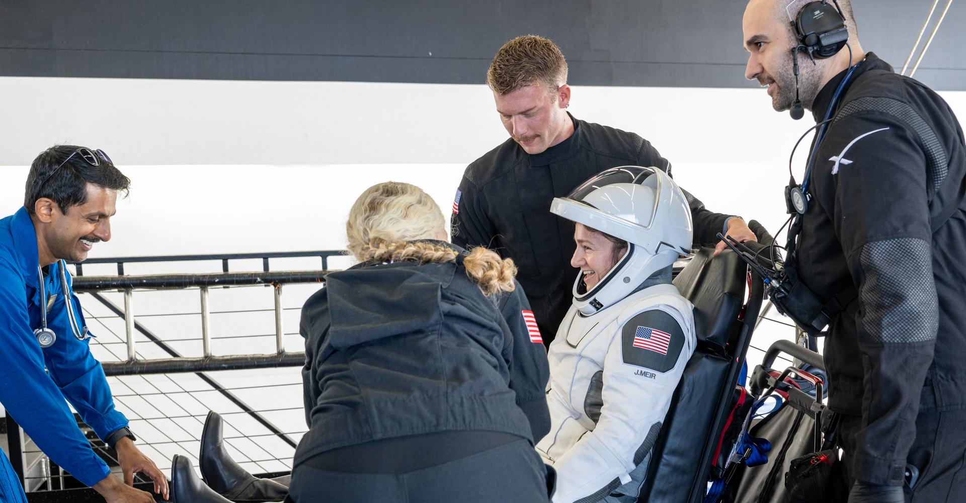 NASA astronaut Jessica Meir is helped out of the SpaceX Dragon Freedom spacecraft onboard the SpaceX recovery ship SHANNON after she, NASA astronaut Jack Hathaway, ESA (European Space Agency) astronaut Sophie Adenot, and Roscosmos cosmonaut Andrey Fedyaev landed in the Pacific Ocean off the coast of Los Angeles, Calif., Thursday, Oct. 8, 2026. Meir, Hathaway, Adenot, and Fedyaev are returning after seven-months in space as part of Expedition 74 aboard the International Space Station. Photo Credit: (NASA/Keegan Barber)