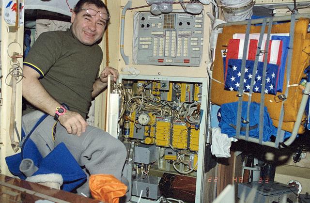 NASA image: Strekalov performing maintenance on Core module control panel