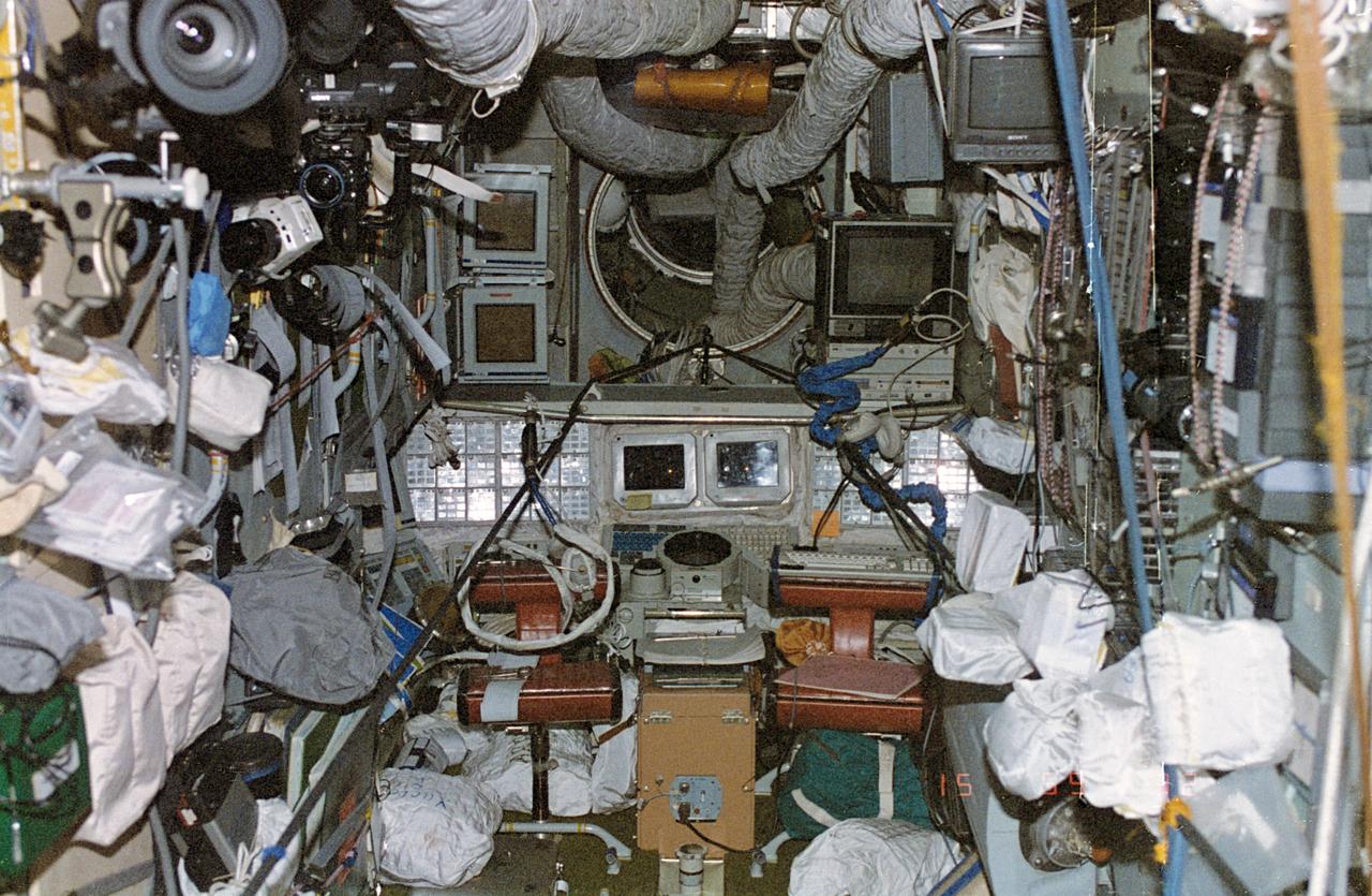 NM18-302-038 (28 June 1995) --- Astronaut Norman E. Thagard, Mir-18 cosmonaut researcher, took this picture aboard Mir on the eve of the targeted arrival day of Atlantis. Thagard told a July 18 press conference audience in Houston that he worked to clean the area prior to the Mir-19 crew and the STS-71 crew arrival and that his showing of this slide represented the first time the crew would have seen the area "in this condition."