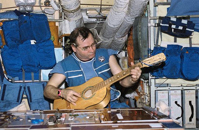 NASA image: Strekalov plays guitar in Mir Core module