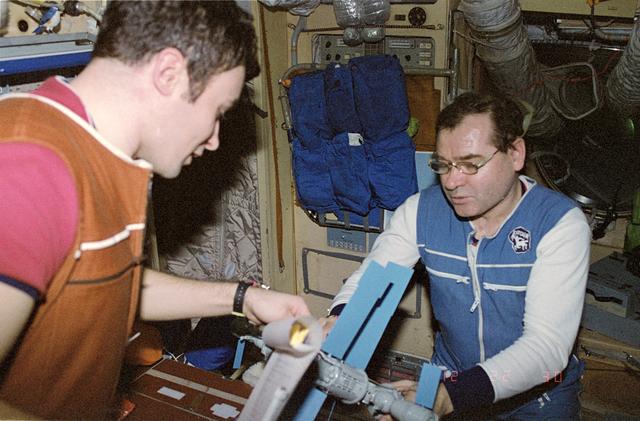 NASA image: Dezhurov and Strekalov review EVA procedures