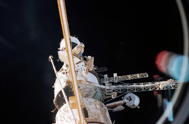 NASA image: View of Mir 21 cosmonauts during EVA to move solar array