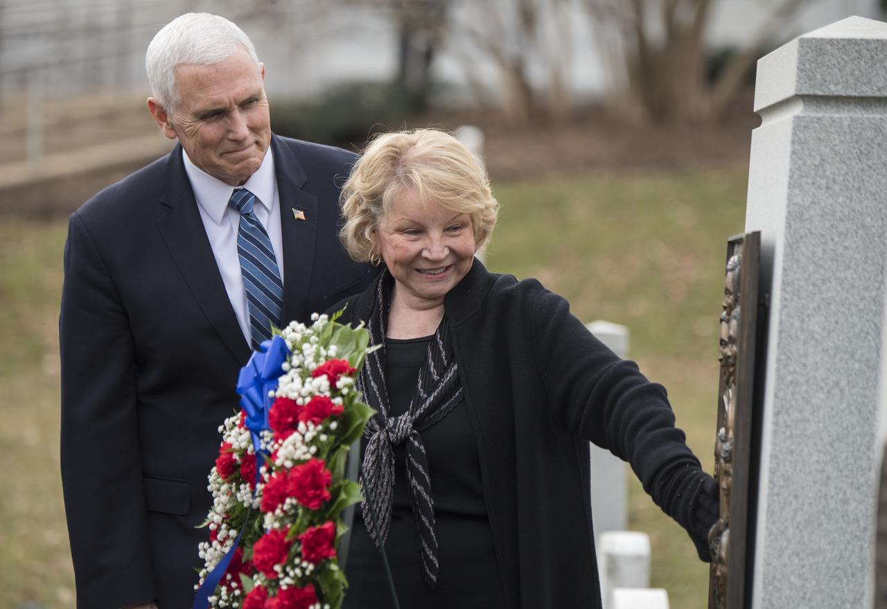 June Scobee-Rodgers, widow of Challenger Commander Dick Scobee, right, visits the Space Shuttle Challenger Memorial with Vice President Mike Pence after a wreath laying ceremony that was part of NASA's Day of Remembrance, Thursday, Feb. 7, 2019, at Arlington National Cemetery in Arlington, Va. Wreaths were laid in memory of those men and women who lost their lives in the quest for space exploration.  Photo Credit: (NASA/Aubrey Gemignani)