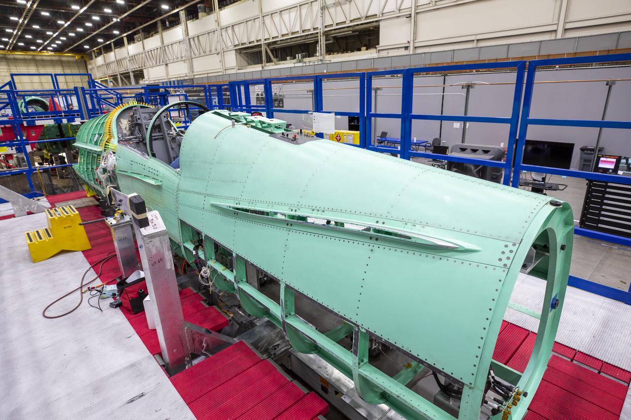 Here is a closer view of the X-59 fuselage section of the aircraft during assembly. The fuselage contains the cockpit and helps define the distinct shape of the X-59.  Lockheed Martin Photography By Garry Tice 1011 Lockheed Way, Palmdale, Ca. 93599 Event: SEG 210 Forebody-Subsystems Date: 5/12/2021