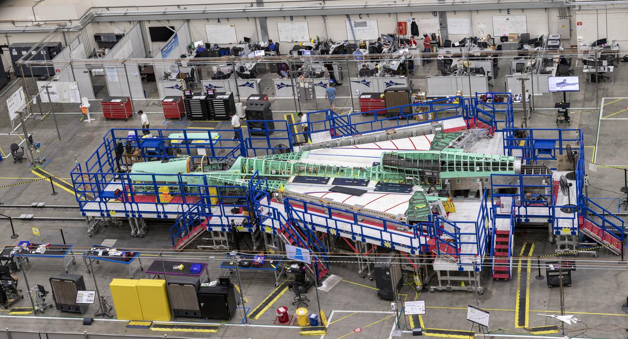 Pictured is an overhead view of the X-59 as it comes together for the major assembly merger in summer 2021.  Lockheed Martin Photography By Garry Tice 1011 Lockheed Way, Palmdale, Ca. 93599 Event: Manufacturing Area From Above Date: 5/26/2021