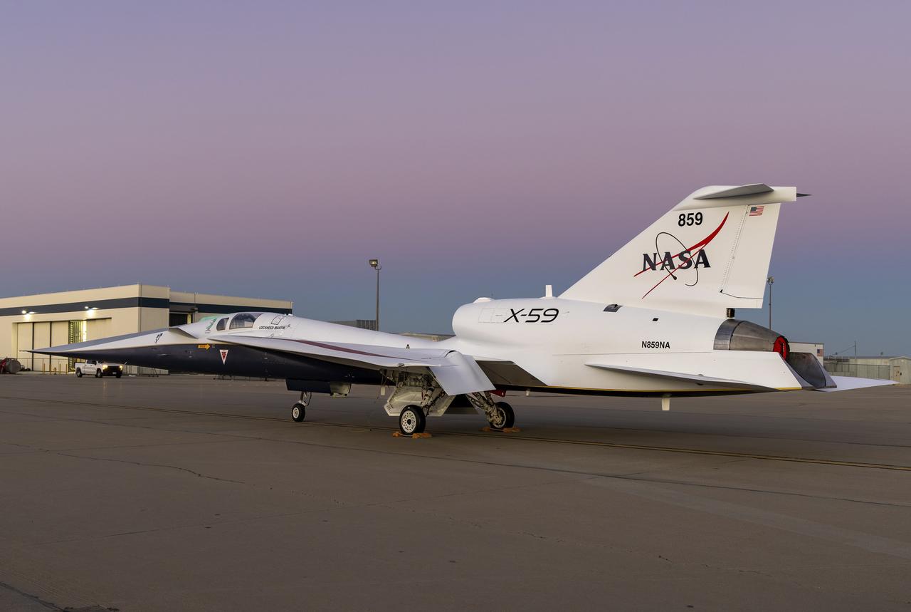 NASA’s X-59 quiet supersonic research aircraft sits on a ramp at Lockheed Martin Skunk Works in Palmdale, California, during sunset. The one-of-a-kind aircraft is powered by a General Electric F414 engine, a variant of the engines used on F/A-18 fighter jets. The engine is mounted above the fuselage to reduce the number of shockwaves that reach the ground. The X-59 is the centerpiece of NASA's Quesst mission, which aims to demonstrate quiet supersonic flight and enable future commercial travel over land – faster than the speed of sound.