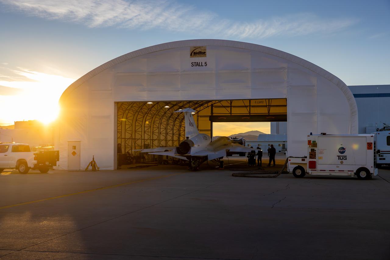 NASA’s X-59 quiet supersonic research aircraft sits inside its run stall in preparation for maximum afterburner testing at Lockheed Martin’s Skunk Works facility in Palmdale, California. Teams conduct final checks on the aircraft before its high-thrust engine runs. The X-59 is the centerpiece of NASA’s Quesst mission designed to demonstrate quiet supersonic flight over land, addressing a key barrier to commercial supersonic travel.