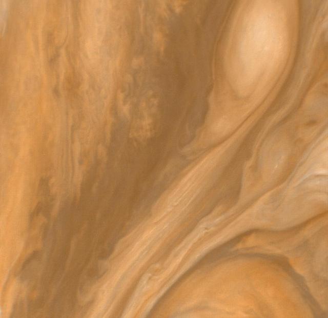 This color view of the region just to the East of the Great Red Spot was taken by NASA Voyager 1 on March 4, 1979 at a distance of 1,000,000 miles 1,800,000 km.  http://photojournal.jpl.nasa.gov/catalog/PIA00019