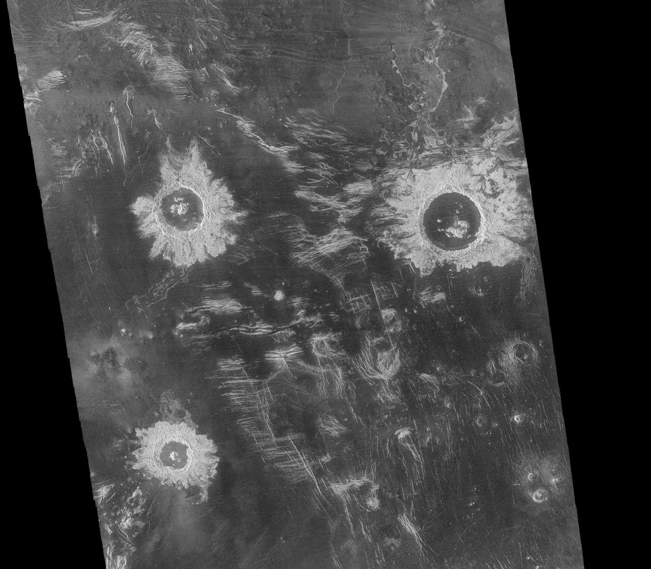 This mosaic from NASA Magellan data is in the Lavinia region of Venus. Three large impact craters can be seen located in a region of fractured plains.  http://photojournal.jpl.nasa.gov/catalog/PIA00086