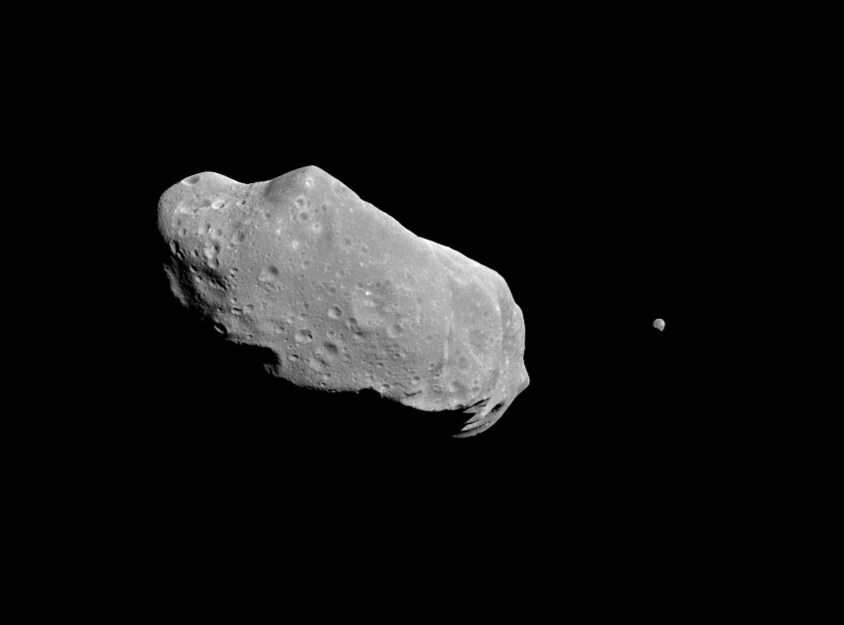 This is the first full picture showing both asteroid 243 Ida and its newly discovered moon to be transmitted to Earth from NASA's Galileo spacecraft -- the first conclusive evidence that natural satellites of asteroids exist.