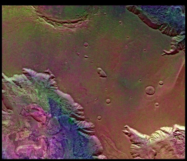 This picture from NASA's Viking Orbiter 2 shows areas of central Valles Marineris, Mars, including Candor Chasm lower left, Ophir Chasm lower right, and Hebes Chasm upper right. http://photojournal.jpl.nasa.gov/catalog/PIA00155