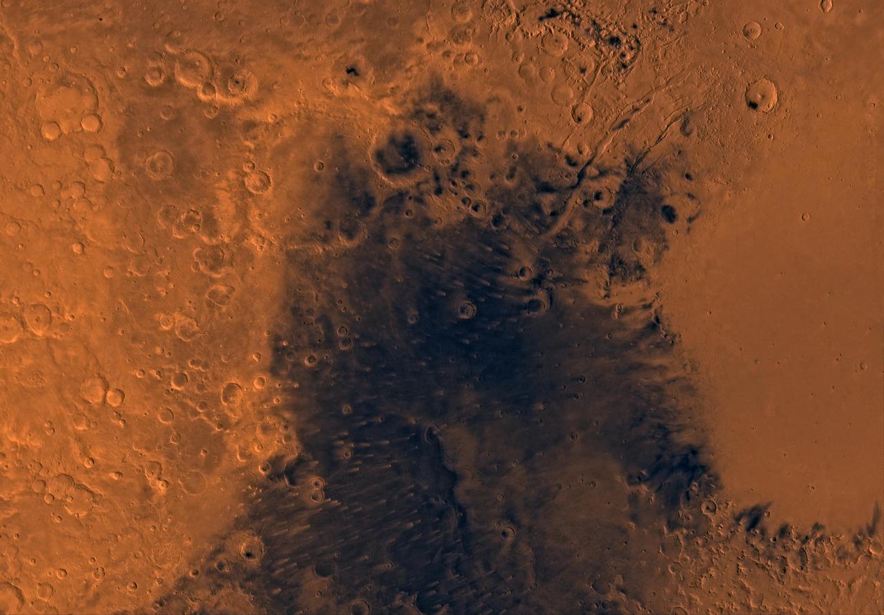 Mars digital-image mosaic merged with color of the MC-13 quadrangle, Syrtis Major region of Mars. This image is from NASA's Viking Orbiter 1. http://photojournal.jpl.nasa.gov/catalog/PIA00173