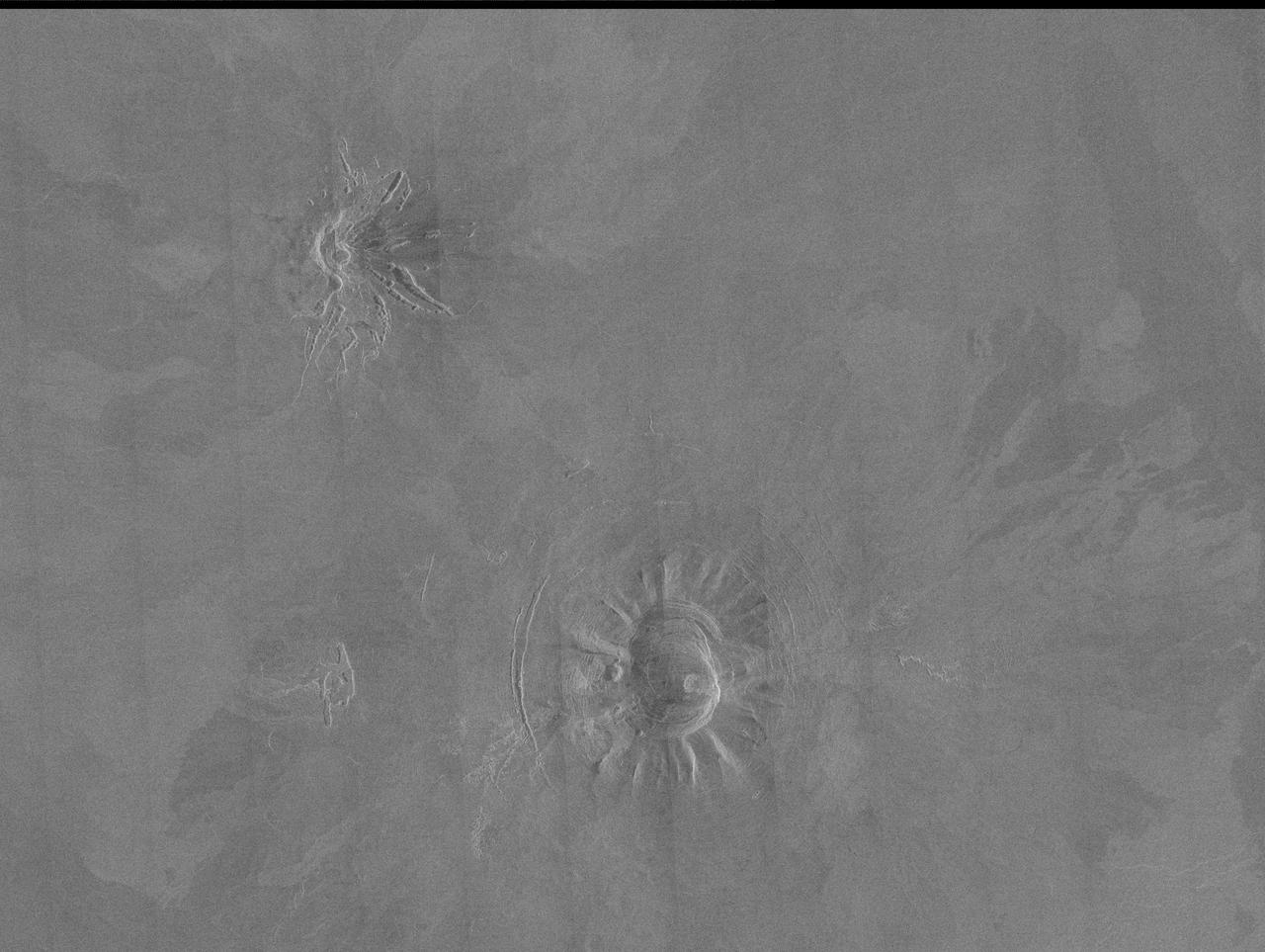 Two unusual volcanic domes are shown in this full-resolution mosaic obtained by NASA Magellan spacecraft. http://photojournal.jpl.nasa.gov/catalog/PIA00244
