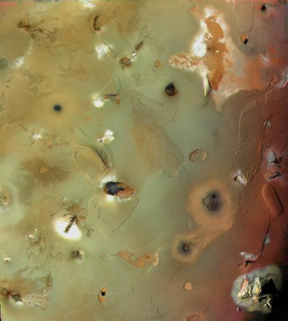 NASA image: Io, Showing Volcanic Plains and Mountains