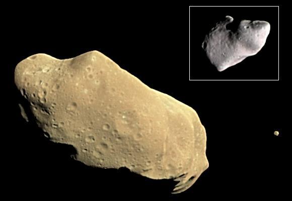 During its examination of the asteroid Ida, NASA Galileo spacecraft returned images of a second object, Dactyl--the first confirmed satellite or moon of an asteroid; the much smaller moon is visible to the right of Ida.  http://photojournal.jpl.nasa.gov/catalog/PIA00333