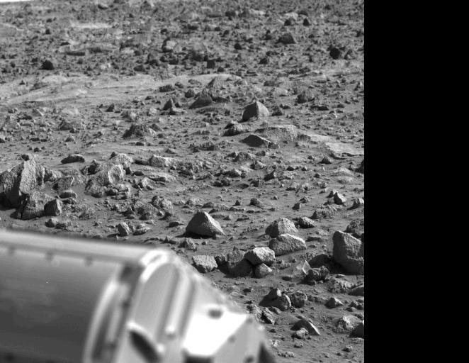 The letter 'B' or perhaps the figure '8' appears to have been etched into the Mars rock at the left edge of this picture taken yesterday by NASA's Viking 1 Lander. It is believed to be an illusion caused by weathering processes and the angle of the sun as it illuminated the scene for the spacecraft camera. The object at lower left is the housing containing the surface sampler scoop.  http://photojournal.jpl.nasa.gov/catalog/PIA00386