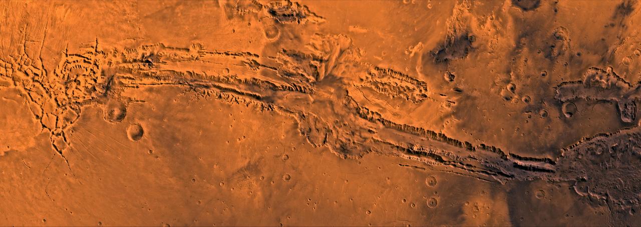 A color image of Valles Marineris, the great canyon of Mars; north toward top. The scene shows the entire canyon system, over 3,000 km long and averaging 8 km deep, extending from Noctis Labyrinthus, the arcuate system of graben to the west, to the chaotic terrain to the east. This image is a composite of Viking medium-resolution images in black and white and low-resolution images in color; Mercator projection. The image extends from latitude 0 degrees to 20 degrees S. and from longitude 45 degrees to 102.5 degrees.  The connected chasma or valleys of Valles Marineris may have formed from a combination of erosional collapse and structural activity. Layers of material in the eastern canyons might consist of carbonates deposited in ancient lakes. Huge ancient river channels began from Valles Marineris and from adjacent canyons and ran north. Many of the channels flowed north into Chryse Basin, which contains the site of the Viking 1 Lander and the future site of the Mars Pathfinder Lander.  http://photojournal.jpl.nasa.gov/catalog/PIA00422