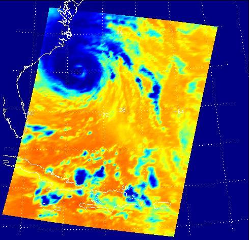 This false-color image shows Hurricane Isabel viewed by the AIRS and AMSU-A instruments at 1:30 EDT in the morning of Thursday September 18, 2003.  Isabel will be ashore within 12 hours, bringing widespread flooding and destructive winds. In figure 1 on the left, data retrieved by the AIRS infrared sensor shows the hurricane's eye as the small ring of pale blue near the upper left corner of the image. The dark blue band around the eye shows the cold tops of hundreds of powerful thunderstorms. These storms are embedded in the 120 mile per hour winds swirling counterclockwise around Isabel's eye. Cape Hatteras is the finger of land north-northwest of the eye. Isabel's winds will soon push ashore a 4- to 8-foot high mound of 'storm surge' and accompanying high surf, leading to flooding of Cape Hatteras and other islands of North Carolina's Outer Banks. Also seen in the image are several organized bands of cold, (blue) thunderstorm tops being pulled into the storm center. Other thunderstorm are forming north of the islands of Jamaica, Cuba, Hispaniola and Puerto Rico near the bottom of the picture.  http://photojournal.jpl.nasa.gov/catalog/PIA00428