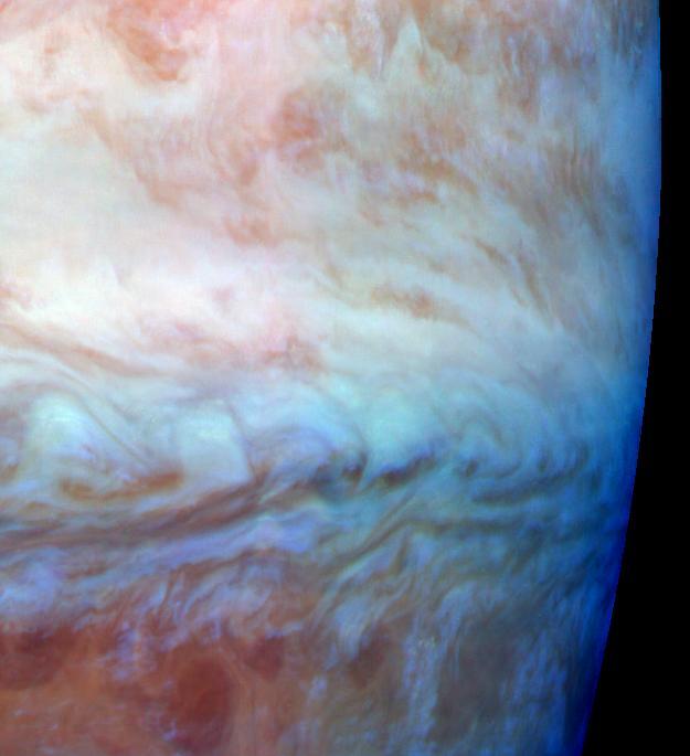This false color mosaic shows a belt-zone boundary near Jupiter equator. The images that make up the four quadrants of this mosaic were taken within a few minutes of each other. These images were taken on Nov. 5, 1996 by NASA Galileo orbiter.
