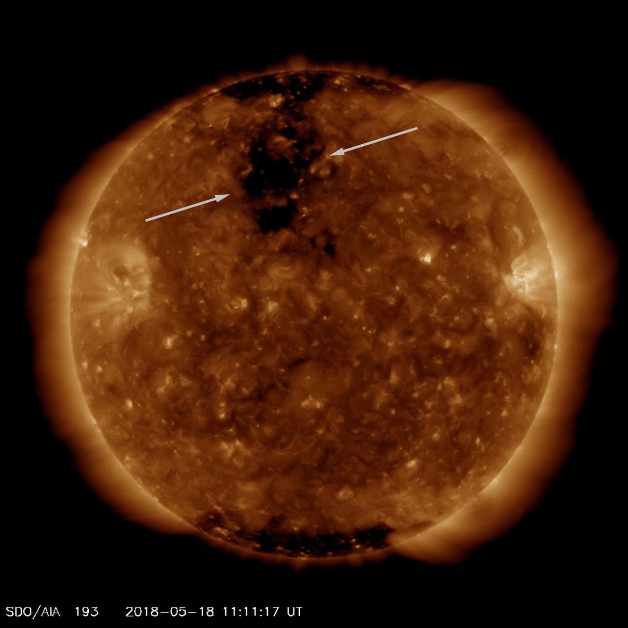A good-sized coronal hole came around to where it is just about facing Earth (May 16-18, 2018). Coronal holes are areas of open magnetic field from which solar wind (consisting of charged particles) streams into space. The video clip covers two days and was taken in a wavelength of extreme ultraviolet light. Such streams of particles take several days to reach Earth, but they can generate aurora, particularly nearer the poles.  An animation is available at https://photojournal.jpl.nasa.gov/catalog/PIA00575