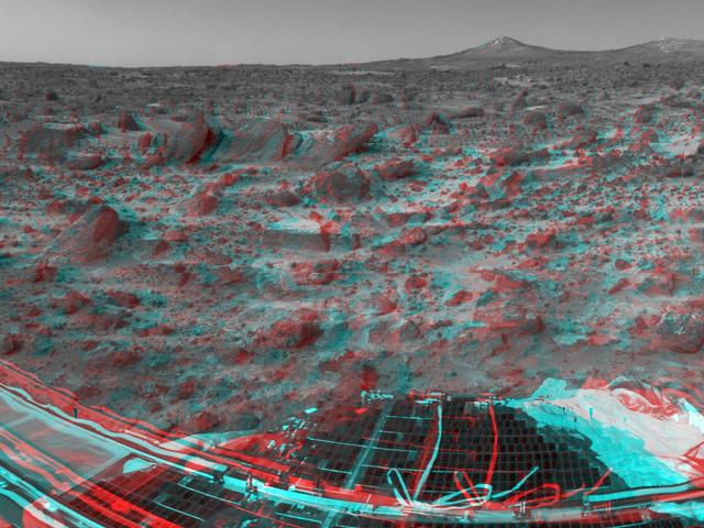 Many prominent rocks near the Sagan Memorial Station are featured in this image, from NASA Mars Pathfinder. Flat Top and Little Flat Top are at center. 3-D glasses are necessary to identify surface detail. 