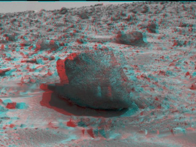 Yogi, a rock taller than NASA rover Sojourner taken in stereo by NASA Mars Pathfinder. 3D glasses are necessary to identify surface detail.