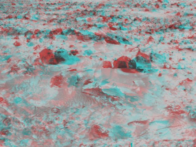 This area of rocky terrain near the Sagan Memorial Station was taken by NASA Mars Pathfinder. 3D glasses are necessary to identify surface detail. 