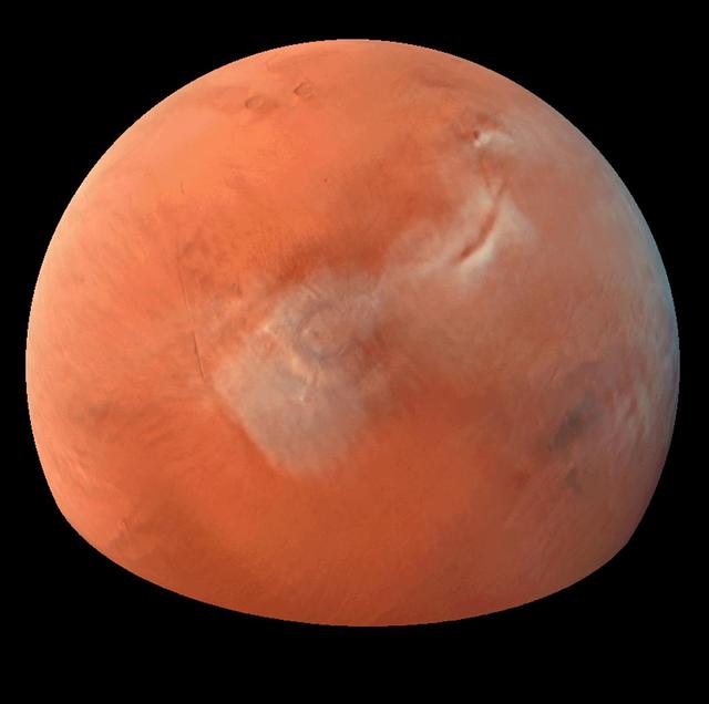 Color composite of condensate clouds over Tharsis made from red and blue images with a synthesized green channel. Mars Orbiter Camera wide angle frames from Orbit 48. http://photojournal.jpl.nasa.gov/catalog/PIA00812